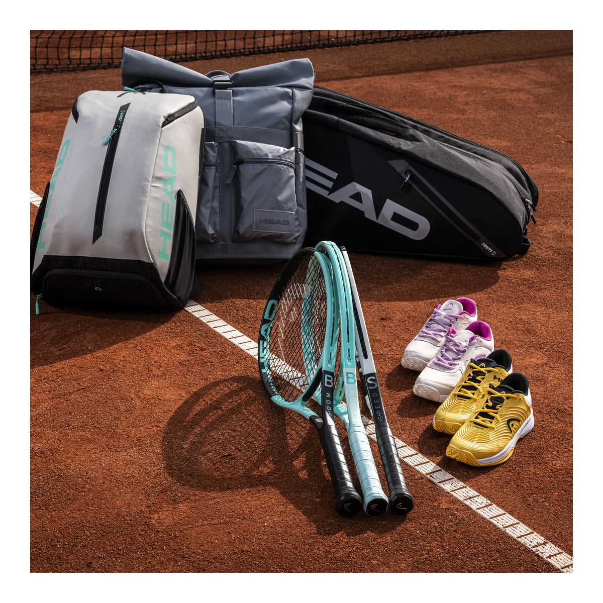 Head Boom Junior 2024 Tennis Racket Black and Teal which is available for sale at GSM Sports