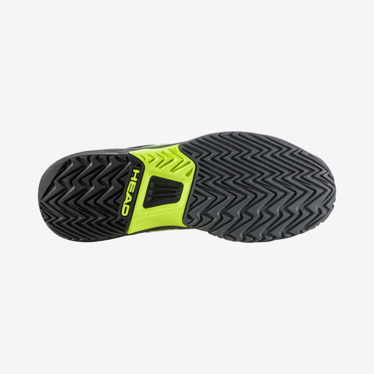 The sole of The Head Revolt Pro 4.0 Junior Tennis Shoes in black and green available for sale at GSM Sports