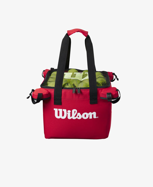The Wilson Tennis Teaching Cart with tennis balls inside for display purposes which is available for sale at GSM Sports.