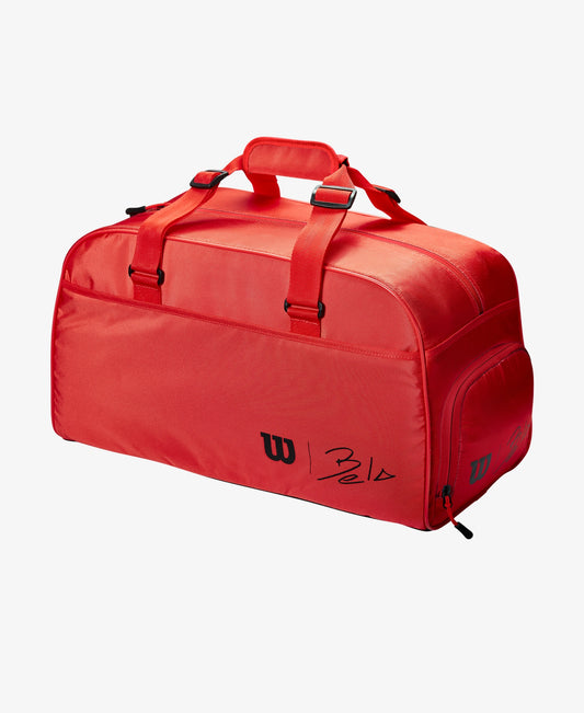 The Wilson Bela Padel Small Duffel Bag in infrared colour available for sale at GSM Sports.      