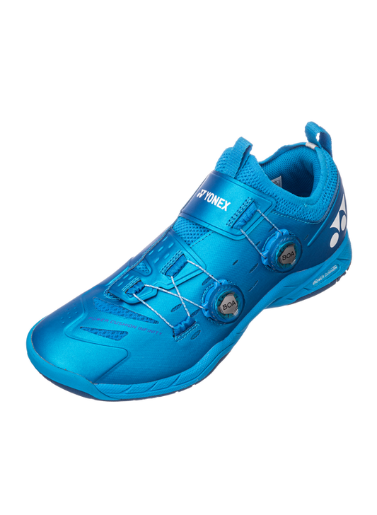 The Yonex Power Cushion Infinity Unisex Badminton Shoes in metallic blue which are available for sale at GSM Sports.    
