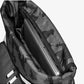 The Wilson Womens Backpack in cream, forest green and black with a laptop inside for display purposes which is available for sale at GSM Sports.